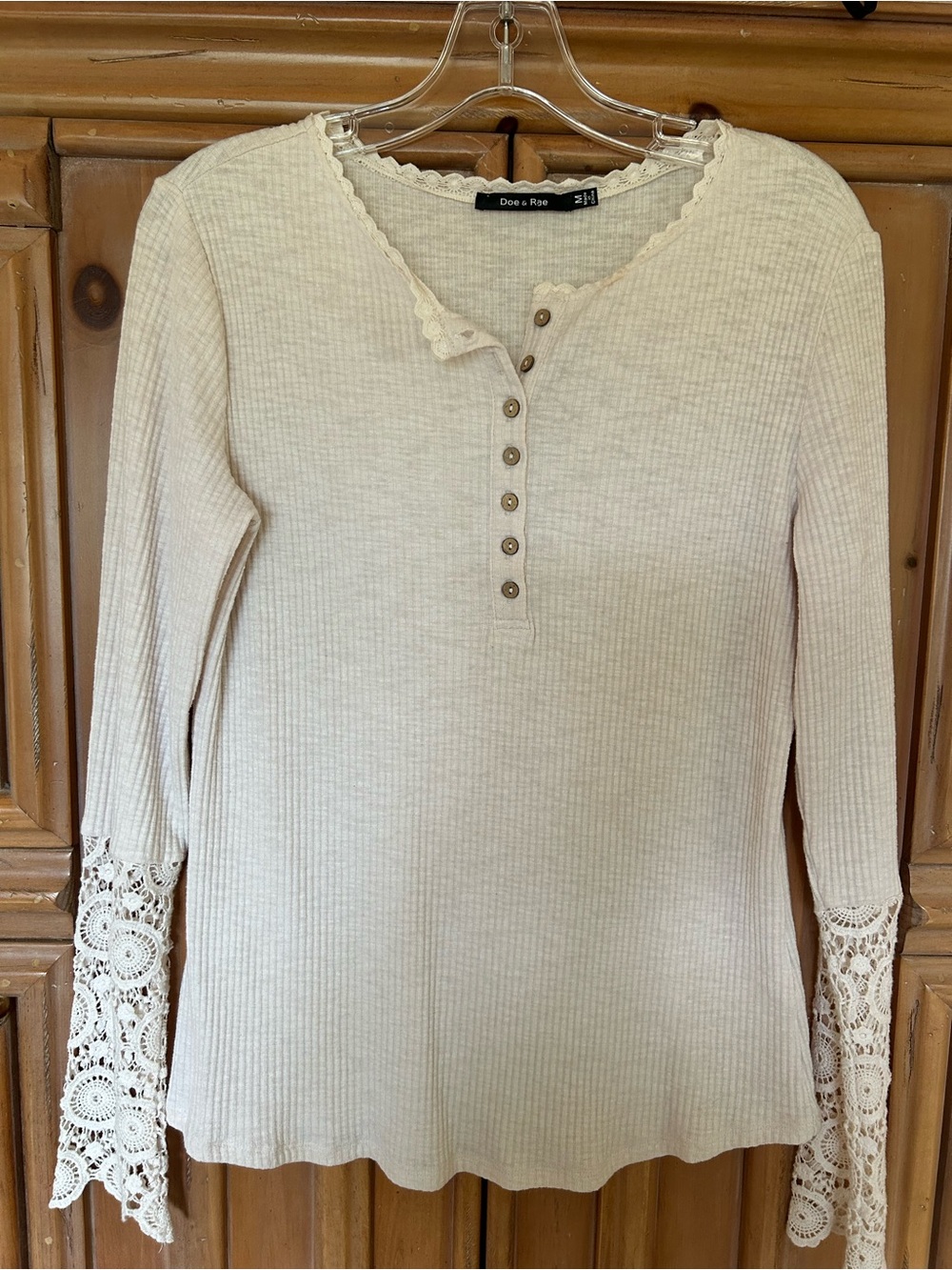 Off white Henley style, long sleeve with lace trim, size M